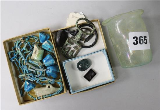 A Roman glass, Egyptian necklace and various antiquities